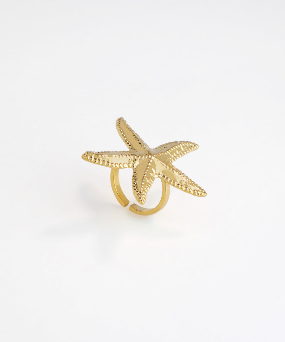 Gold-tone ring with large textured starfish design