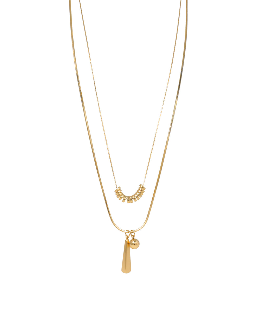 Gold-tone layered necklace with geometric cone and sphere charms and a curved bead detail on the upper chain