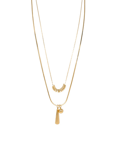 Gold-tone layered necklace with geometric cone and sphere charms and a curved bead detail on the upper chain