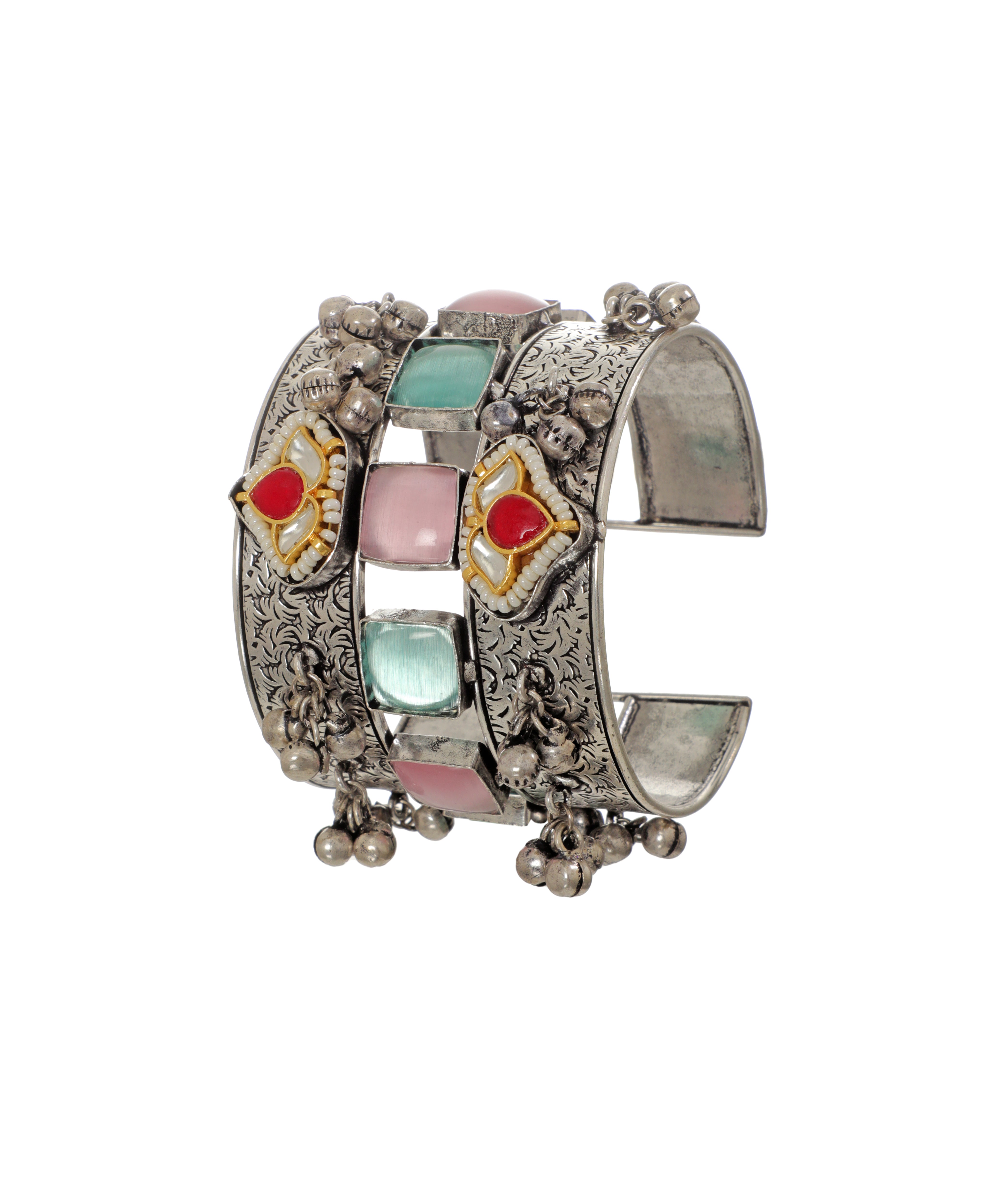 Oxidise silver-tone cuff bracelet with engraved patterns, pastel square stones, red accents, and ghungroo drops.