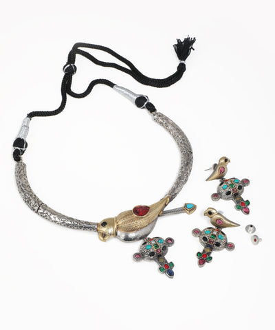 Oxidized silver-tone necklace set with gold-tone birds and multi-color glass stones