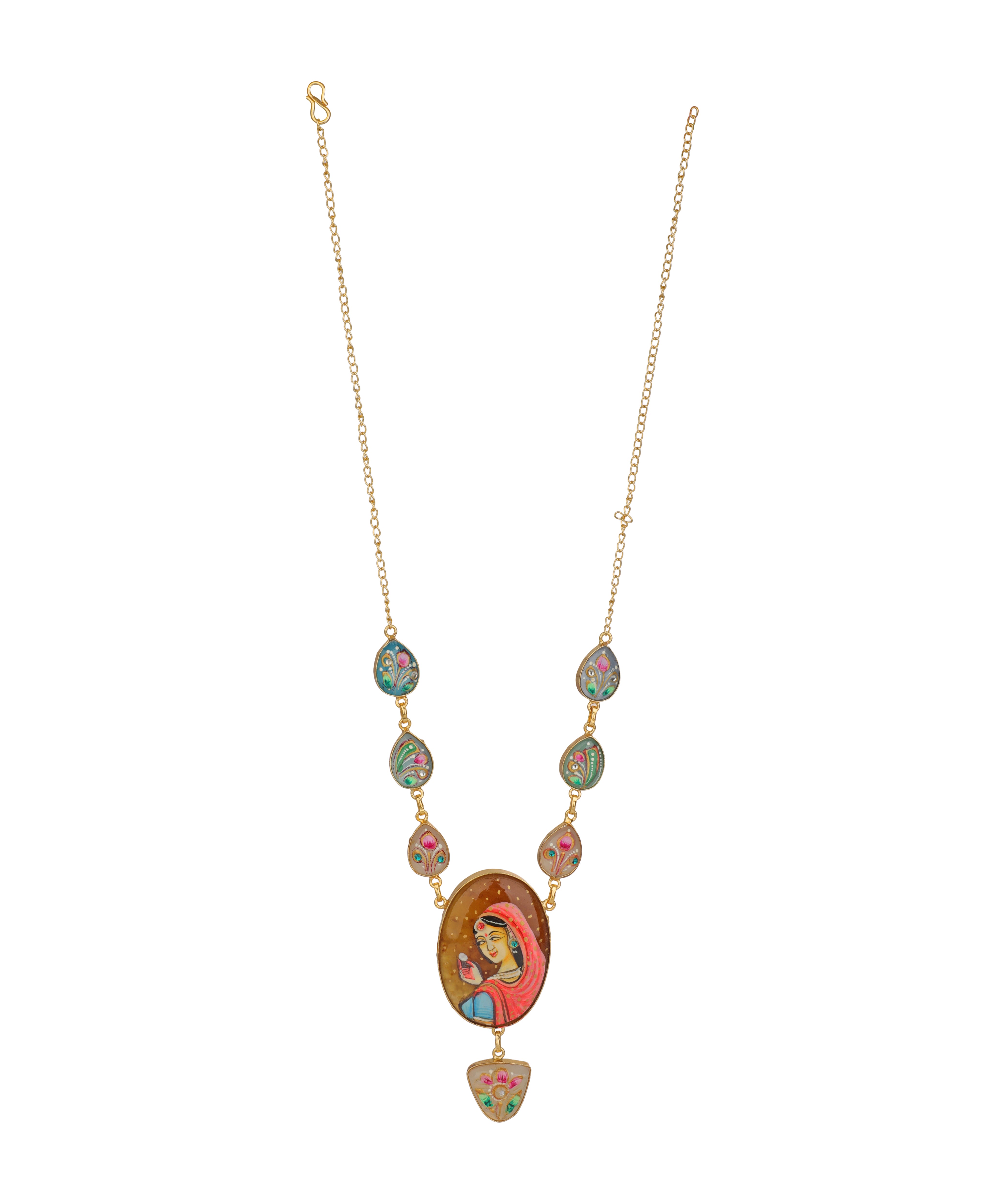 A gold-tone chain necklace featuring a colorful religious pendant with a central oval depiction of the Virgin Mary, flanked by small green and pink enamel stones, on a plain white background.