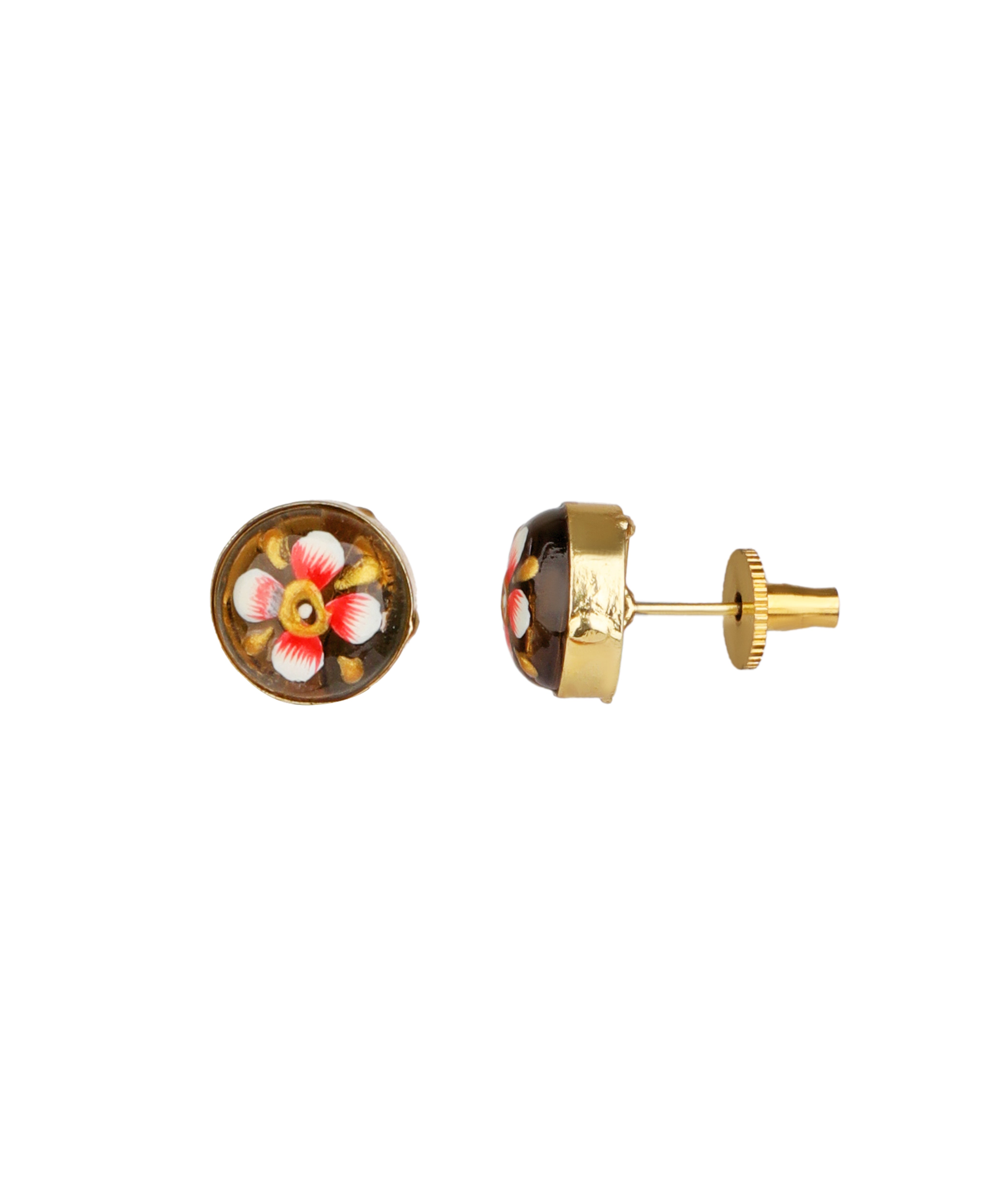 A pair of gold stud earrings featuring a circular black enamel face decorated with a hand-painted floral motif in pink, white, and yellow, shown against a plain white background.