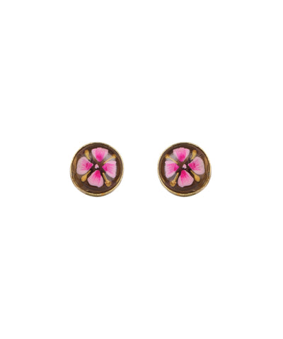 A pair of oval stud earrings with a brown background and a pink flower design, set in a gold-tone metal frame, shown on a plain white background.