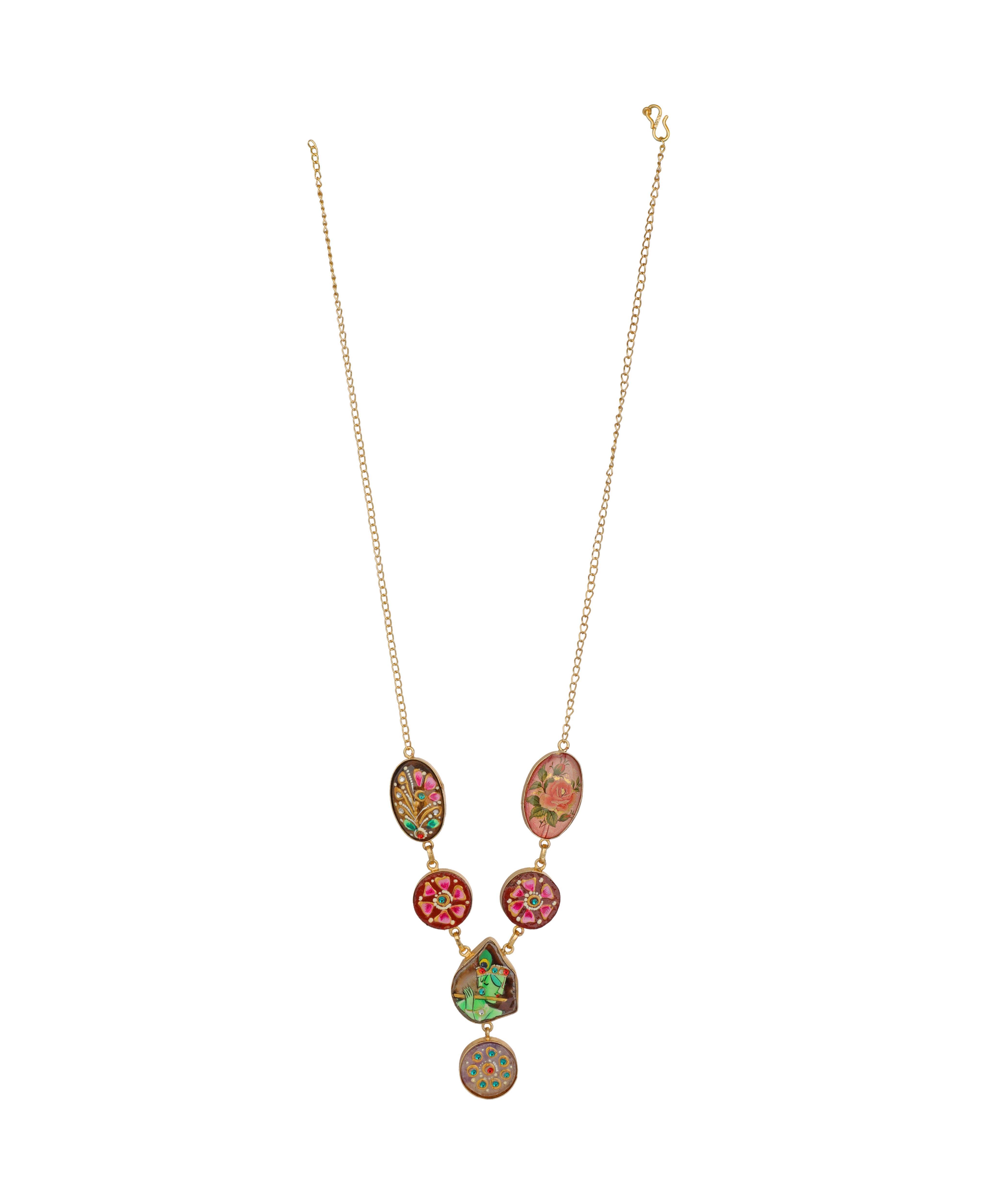 A gold chain necklace featuring a vertical drop design with oval and round charms decorated with colorful floral and paisley patterns in red, green, and gold, set against a plain white background.