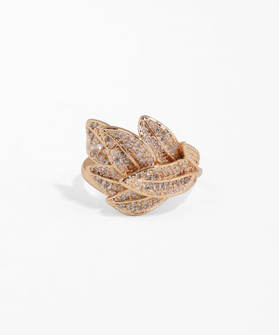 Rose gold ring with diamond accents on a white background