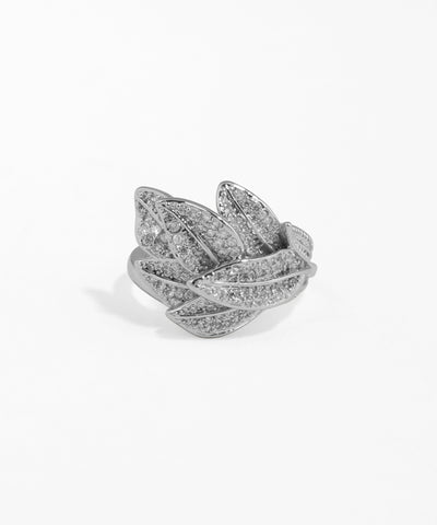 Silver ring with leaf design on a white background