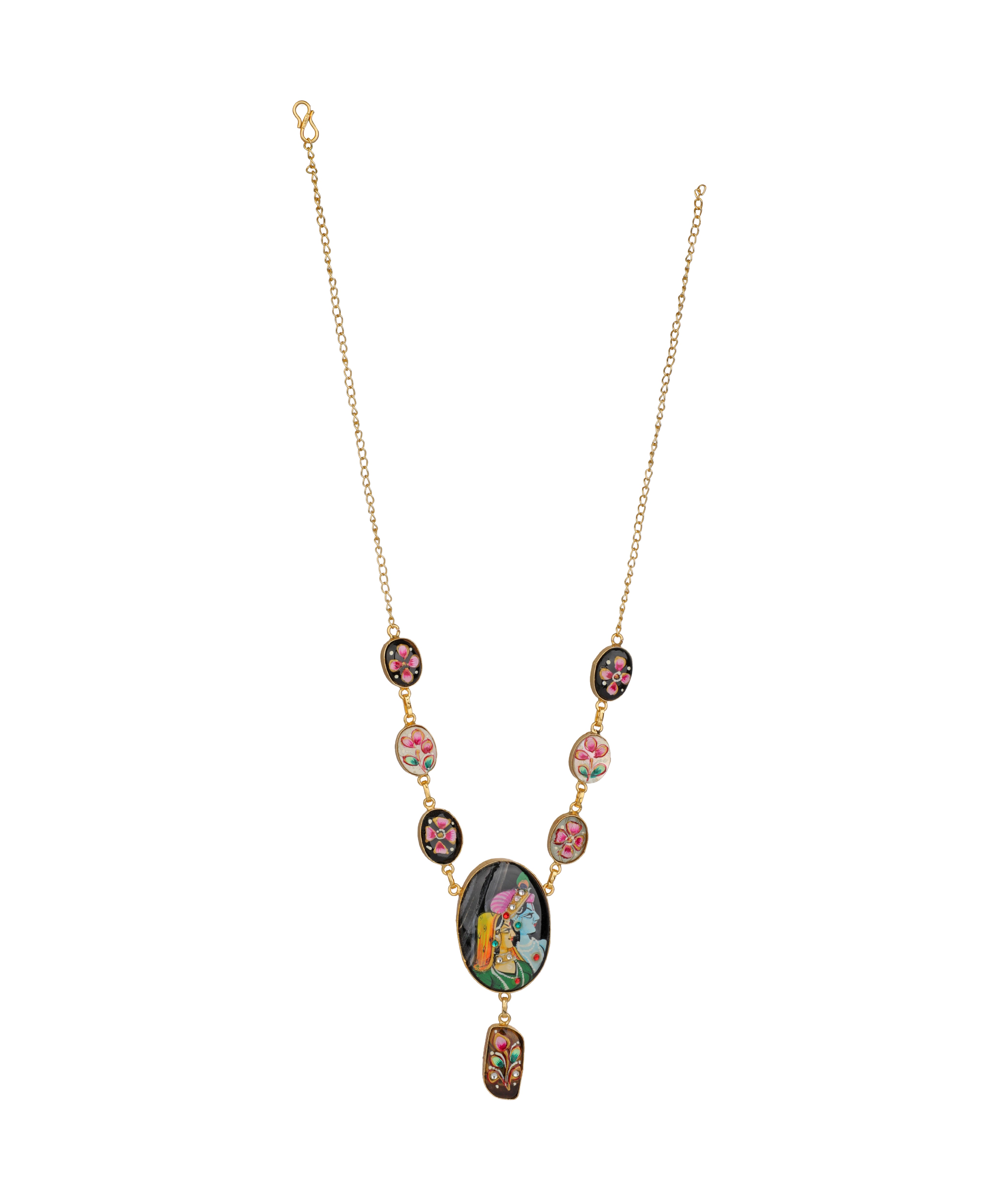 A gold chain necklace featuring a central oval pendant and a dangling charm, both decorated with colorful floral and botanical patterns, accented by small oval and round beads on either side of the chain.