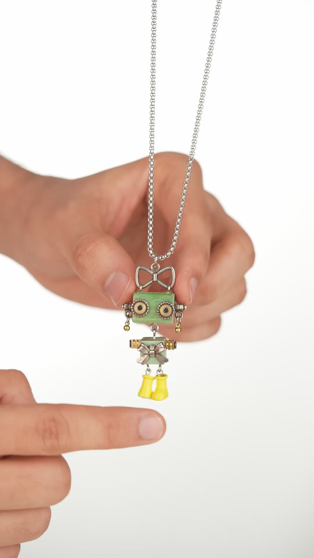 Load video: Robot Bow Pendant Necklace | Stylika