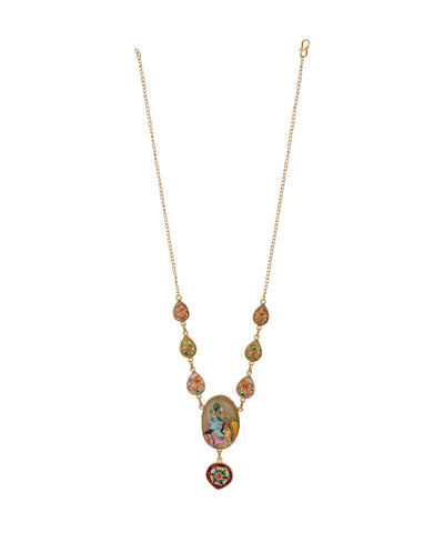 A gold chain necklace featuring a series of colorful, hand-painted glass cabochons and a central oval pendant with a floral illustration, set against a plain white background.